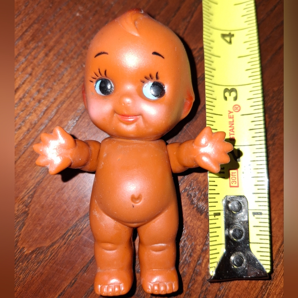 Vintage Kewpie Doll  4” Vinyl Rubber. Brown. Made In Japan.